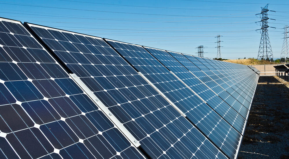 Solar panels feed utility lines.